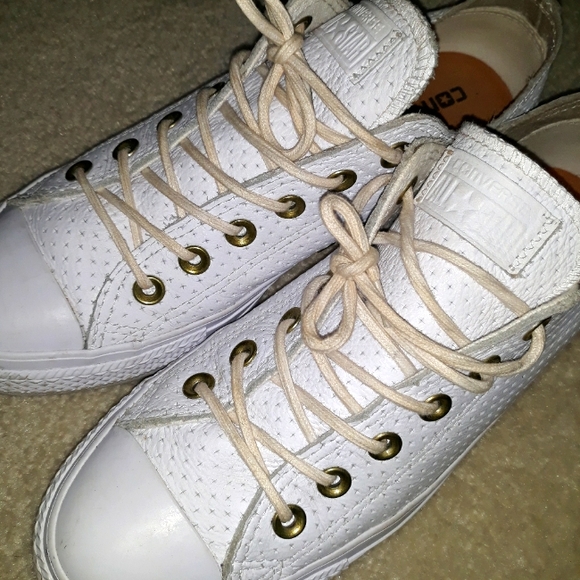 Converse perforated leather tennis shoes. Size 7 men's or 9 women's